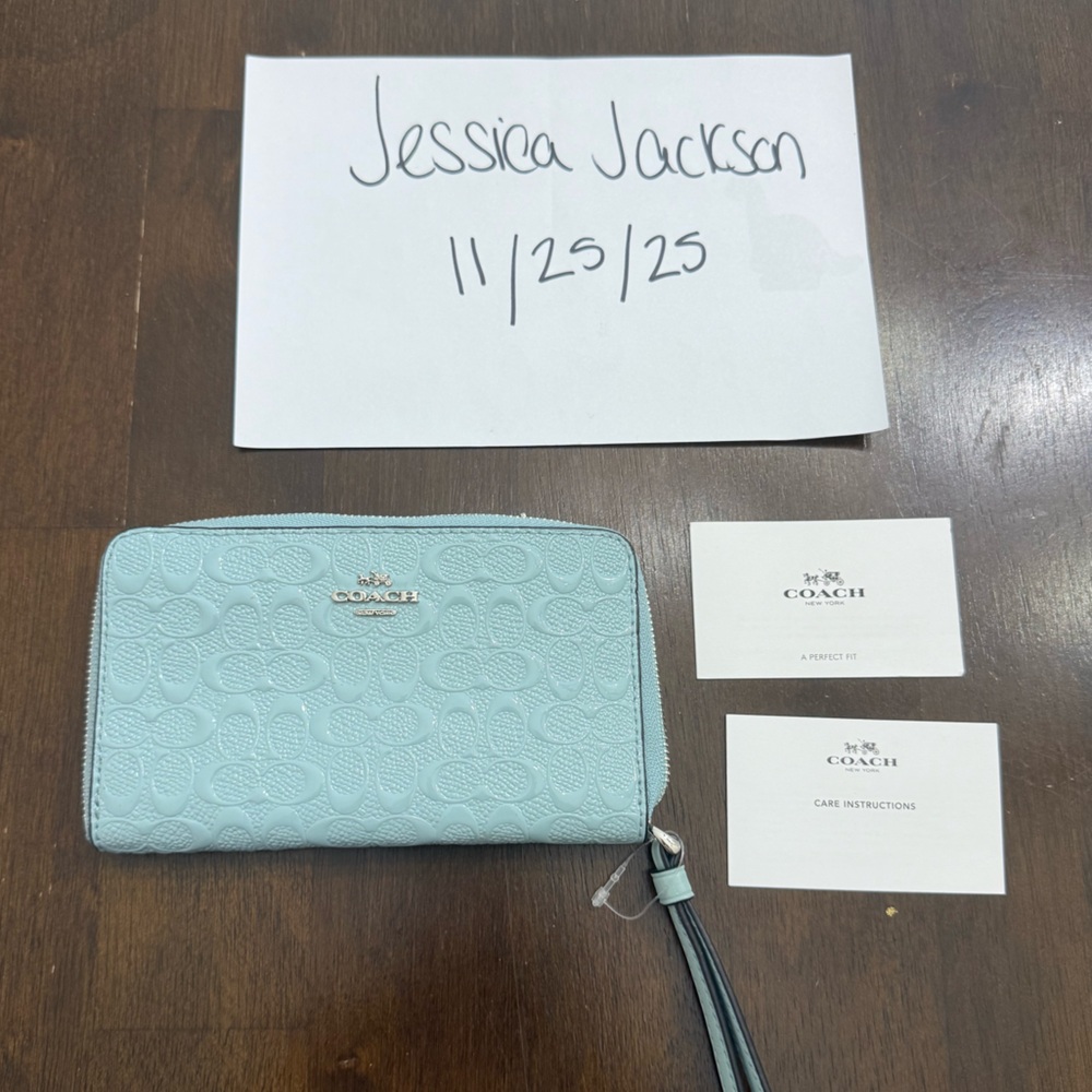 Coach Light Blue Embossed Wristlet
